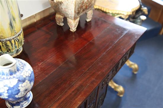 A large Chinese Hundred Shou rosewood (hongmu) altar table, early 20th century, length 258cm, depth 50cm, height 93.5cm, restorations